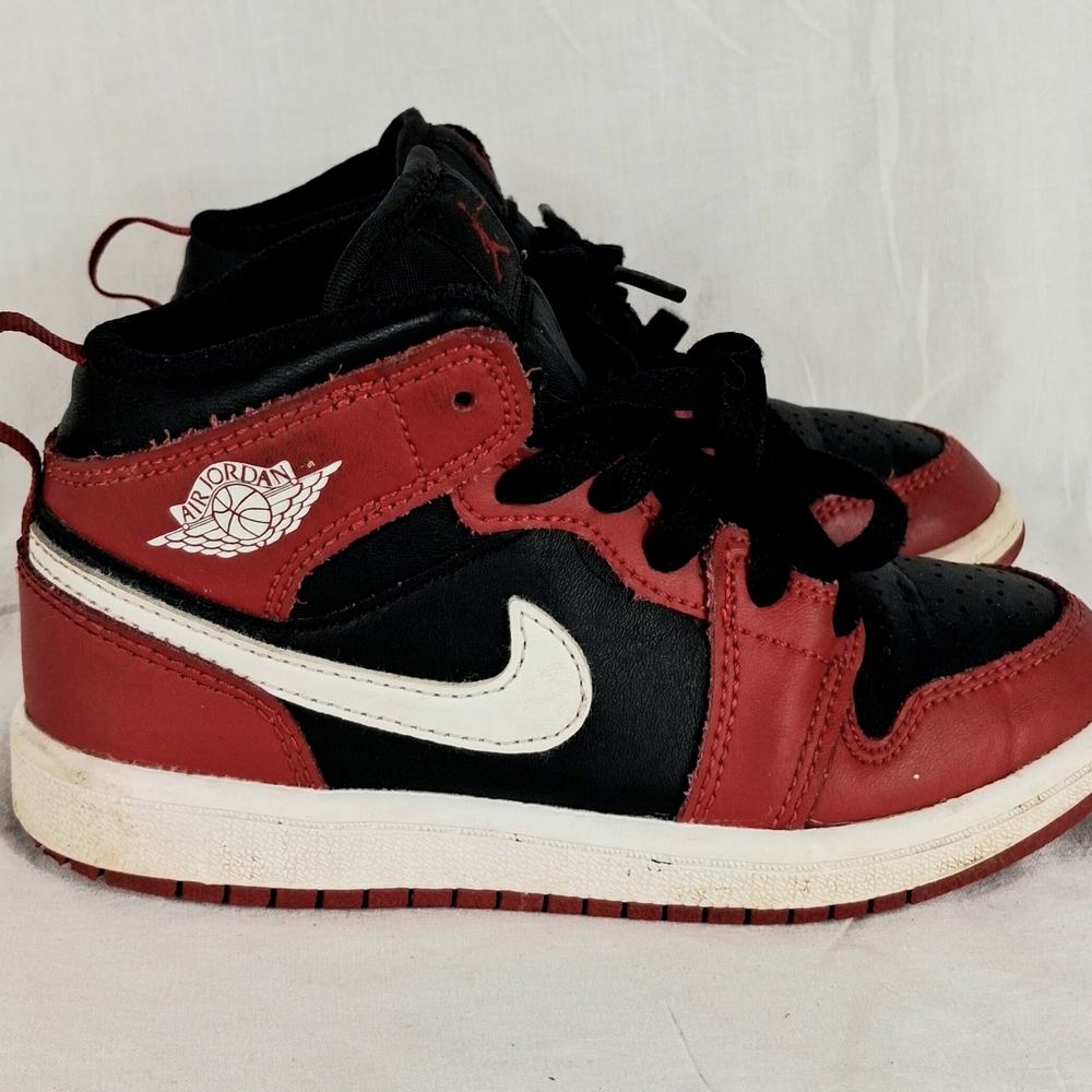 Kids Jordan Black and Red Sneakers